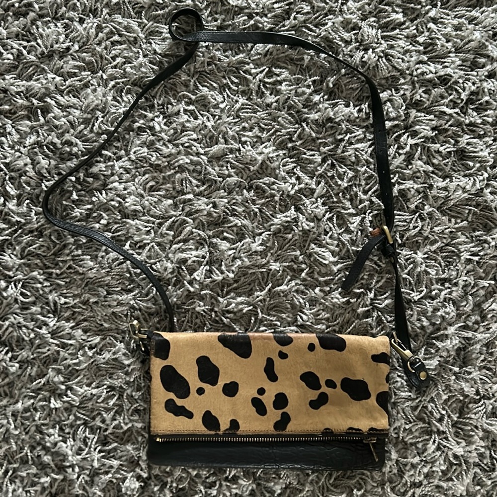 Purse bought in New Zealand. Barely used . Just no use for it anymore .